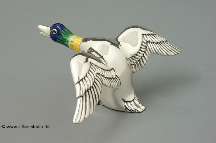 Silber Ente fliegend